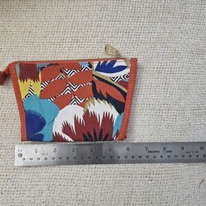 Estee Lauder cosmetic bag.